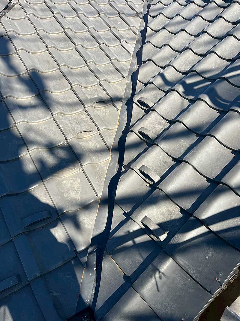 交換後の谷板金